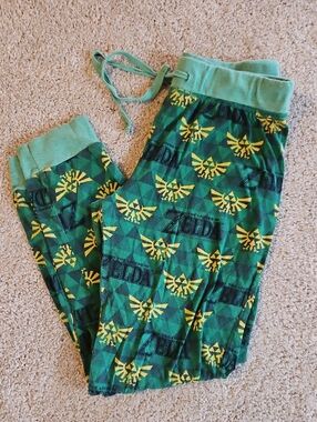 The Legend Of Zelda Green Lounge Pants with Yellow Crest Print